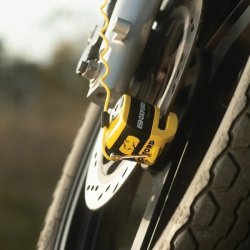 candado de disco oxford micro x45 con alarma amarillo negro lk213